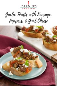 Garlic toast with sausage, peppers, and goat cheese. #appetizer #crostini