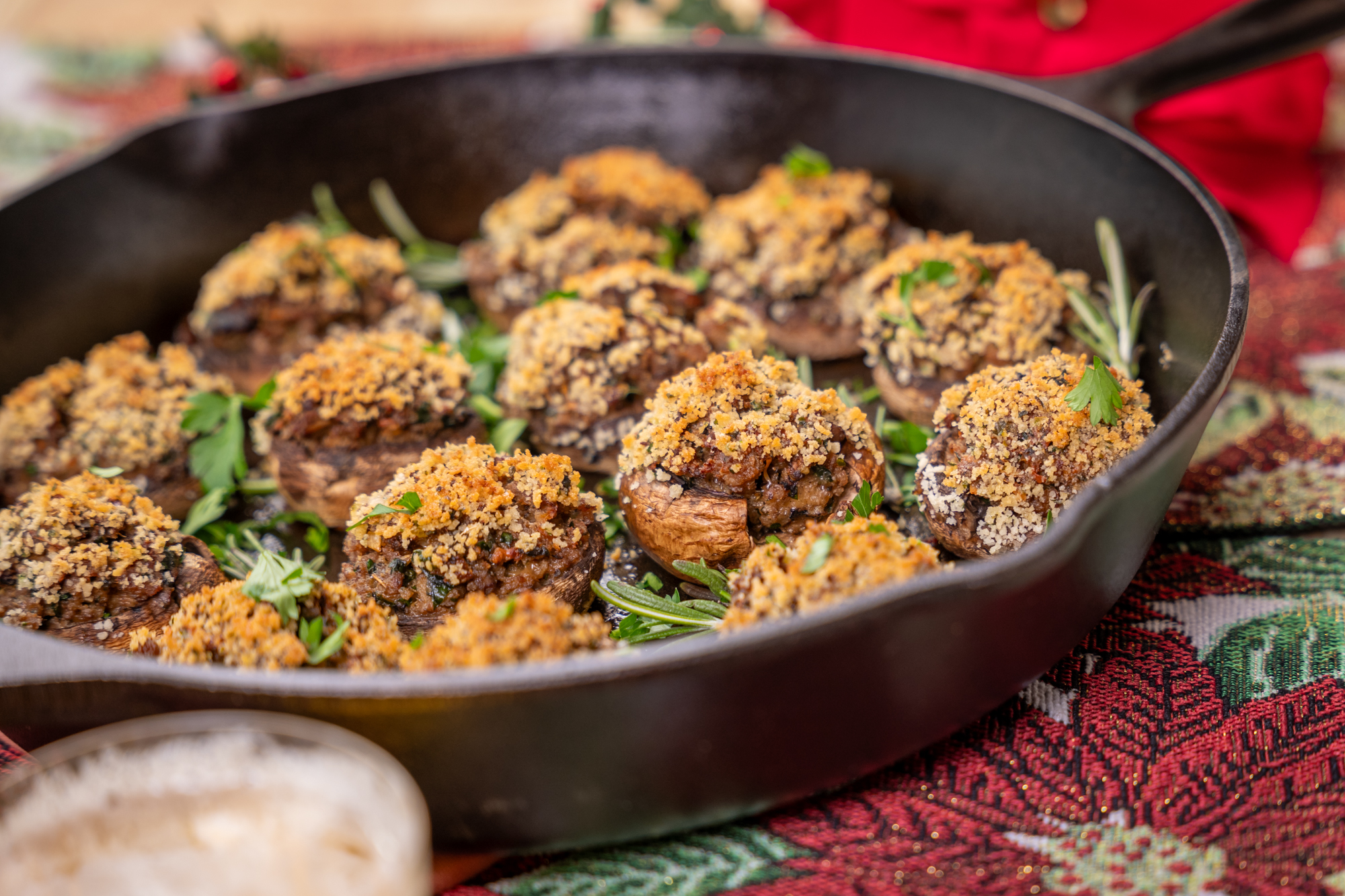 Cast iron skillet with Isernio's Italian Sausage Stuffed Mushrooms